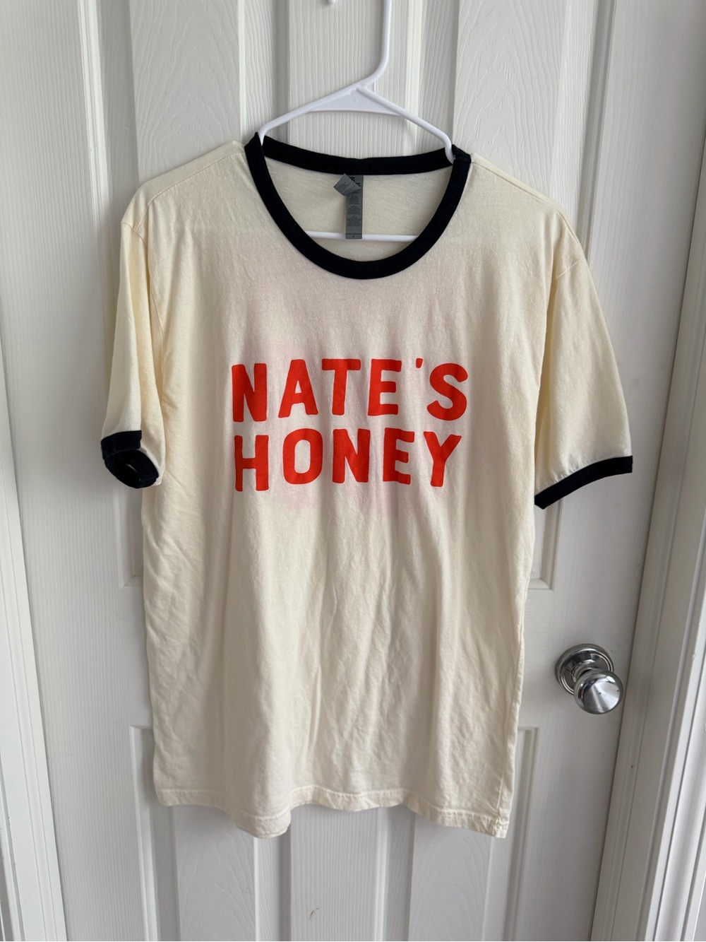 Nate's Honey Cream Ringer Tee with orange Print